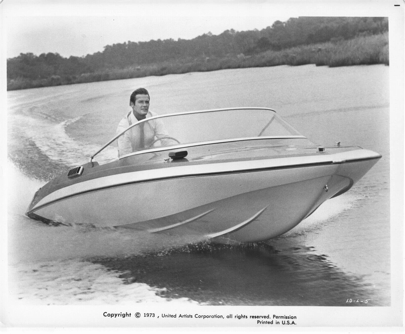Roger Moore piloting the Glastron GT-150 speedboat in Live and Let Die.